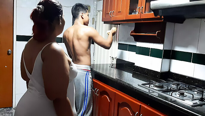 Milf And Neighbor Engage In Passionate Kitchen Encounter